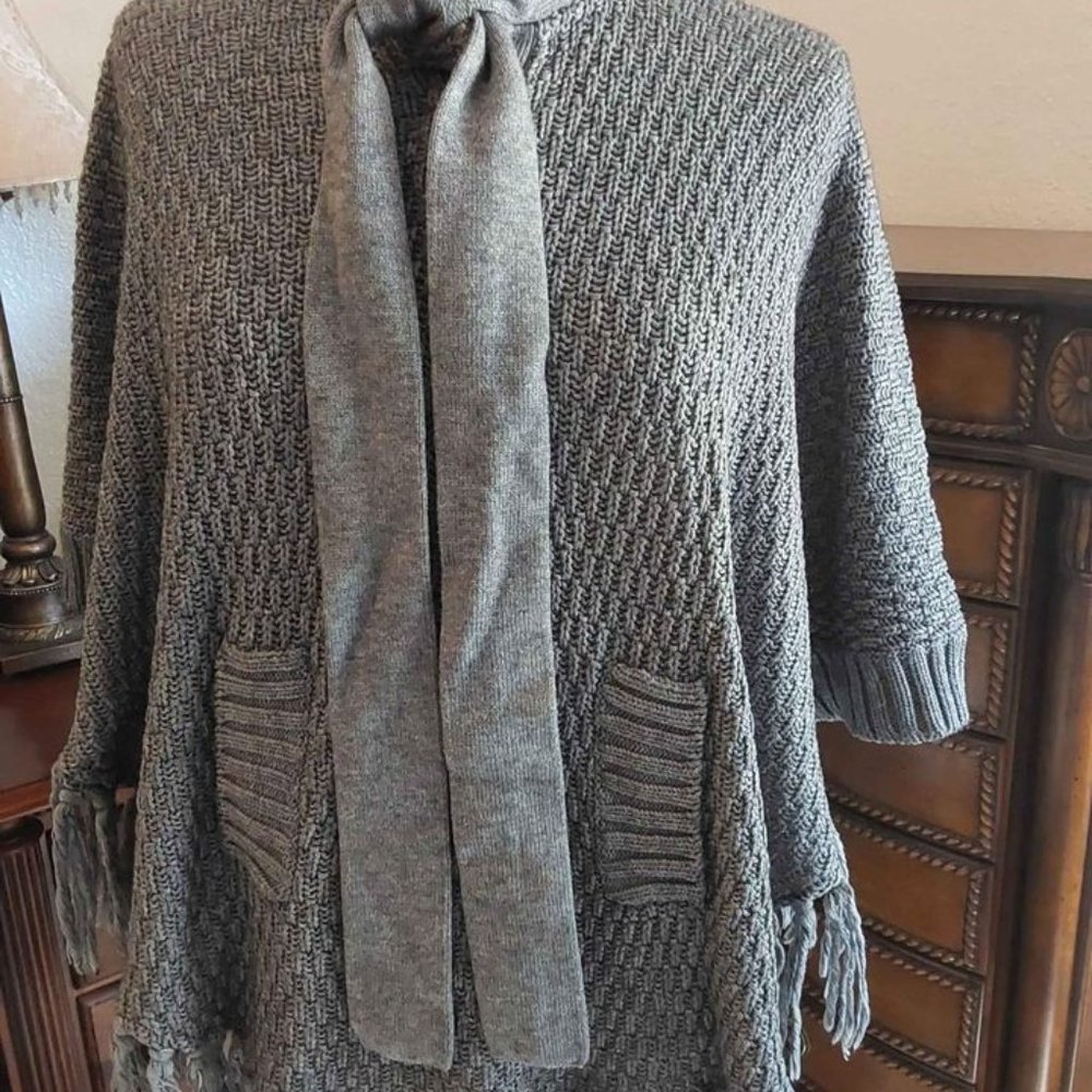 Josephine by for Joseph Knitted Poncho with tassel fringe and kangaroo p…